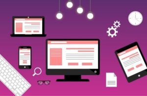 best premium Shopify themes - Digital workspace with computer, mobile devices, and office accessories on purple background.
